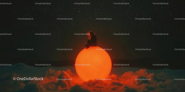 Silhouette Sitting On Large Glowing Orange Sphere