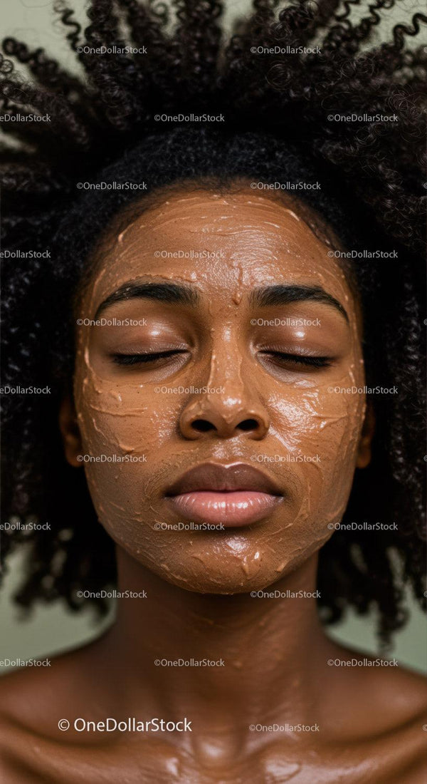 Woman with Curly Hair Applying Clay Facial Mask for Skincare