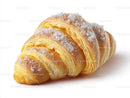 Fresh Croissant with Flaky Layers and Powdered Sugar Topping