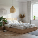 Cozy white bedding in minimalist wooden bedroom