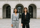 Stylish Business Women Standing Outdoors in Urban Environment