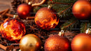 Festive holiday ornaments with cinnamon and pine greenery