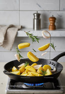 Sautéing Potatoes with Rosemary and Garlic in Pan