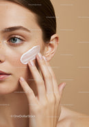 Close-Up of a Woman Applying Skincare Cream on Her Face for Healthy Skin