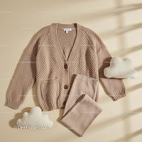 Cozy beige knit cardigan with soft lounge pants flat lay