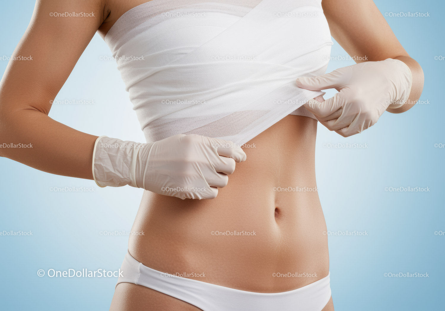 Woman in White Medical Gloves Checking Abdomen for Health Assessment