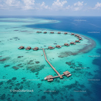 Overwater Bungalows in Clear Turquoise Lagoon Surrounded by Coral Reef