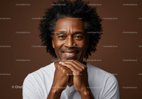 Happy Mature Man with Afro Hair and Warm Smile in Studio