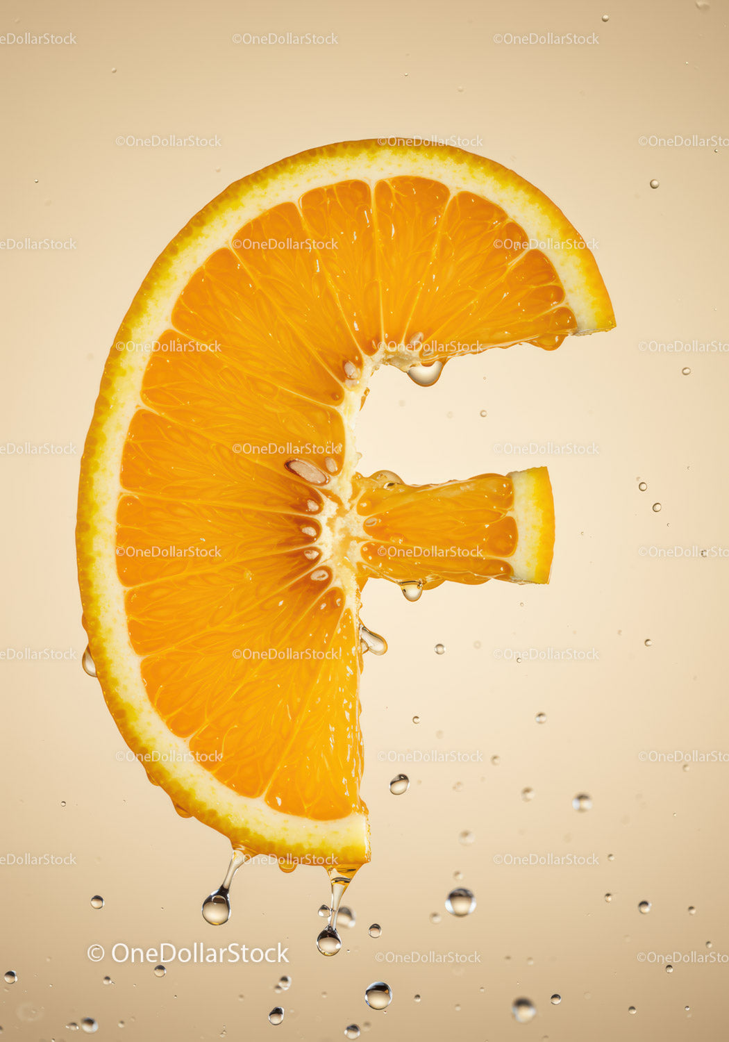 Fresh juicy orange slice dripping with water