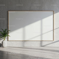 Minimalist interior with large blank canvas and potted plant