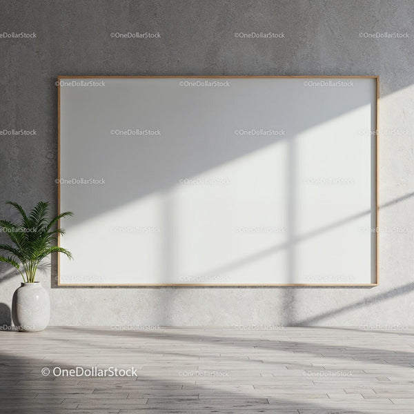 Minimalist interior with large blank canvas and potted plant JPG Mockup Image