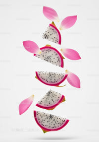 Sliced Dragon Fruit with Pink Petals Floating