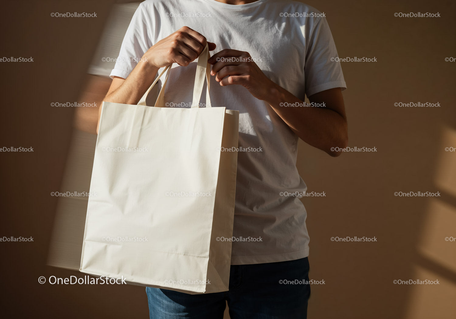 Man holding blank white reusable shopping bag indoors