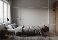 Modern Bedroom Interior with Gray Bedding and Wooden Furniture