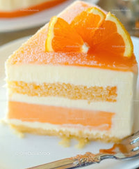 Delicious Orange Layer Cake with Creamy Frosting