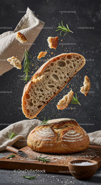 Rustic sourdough bread slice with fresh rosemary herb