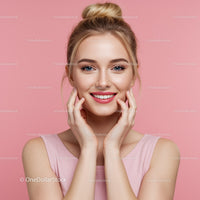 Bright Portrait of Smiling Blonde Woman with Blue Eyes on Pink Background