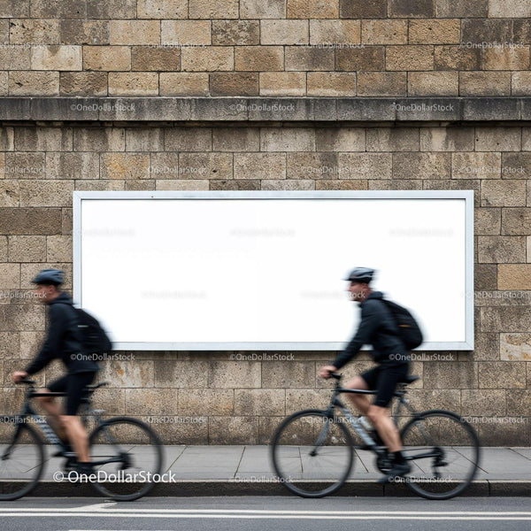 Cyclists Passing Blank Billboard on Urban Stone Wall JPG Mockup Image
