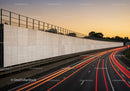 City Highway with Light Trails During Sunset in Urban Environment