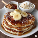Golden Banana Pancakes with Honey and Oats for Breakfast