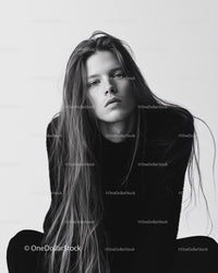 Stunning Black and White Portrait of a Young Woman with Long Hair
