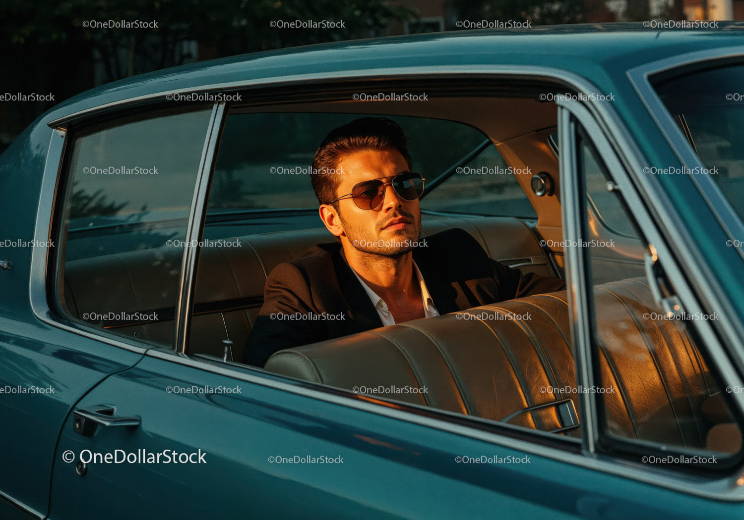 Stylish Man in Vintage Classic Car Wearing Sunglasses