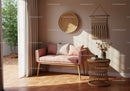 Cozy living room corner with blush sofa and wicker decor