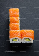 Fresh Salmon Sushi Rolls Arranged on Black Plate