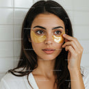 Young Woman Applying Under Eye Patches for Skincare Routine