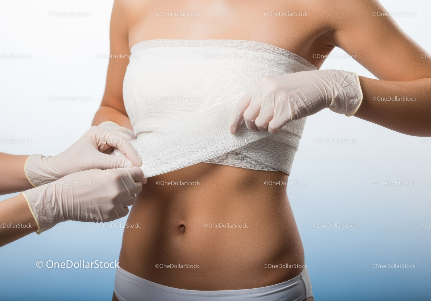 Doctor Applying Bandage on Female Patient's Abdomen in Medical Examination