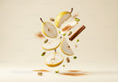 Fresh Pear Slices with Cinnamon and Pistachios Floating