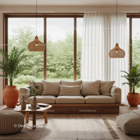 Cozy living room with large window and natural decor