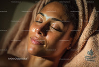 Relaxing Woman with Glowing Skin During Facial Treatment
