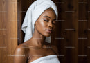 Relaxing Woman with Towel and Calm Expression in Spa Setting