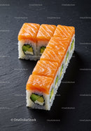 Fresh salmon sushi rolls with avocado and cream cheese