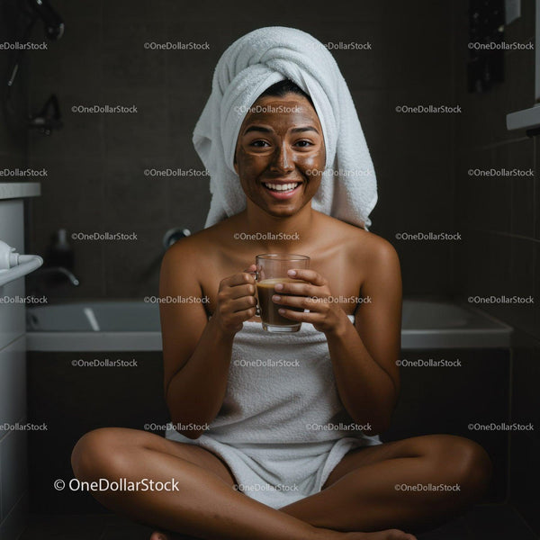 Young Woman with Face Mask and Towel Drinking Coffee in Spa