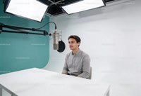 Man recording podcast in modern professional studio