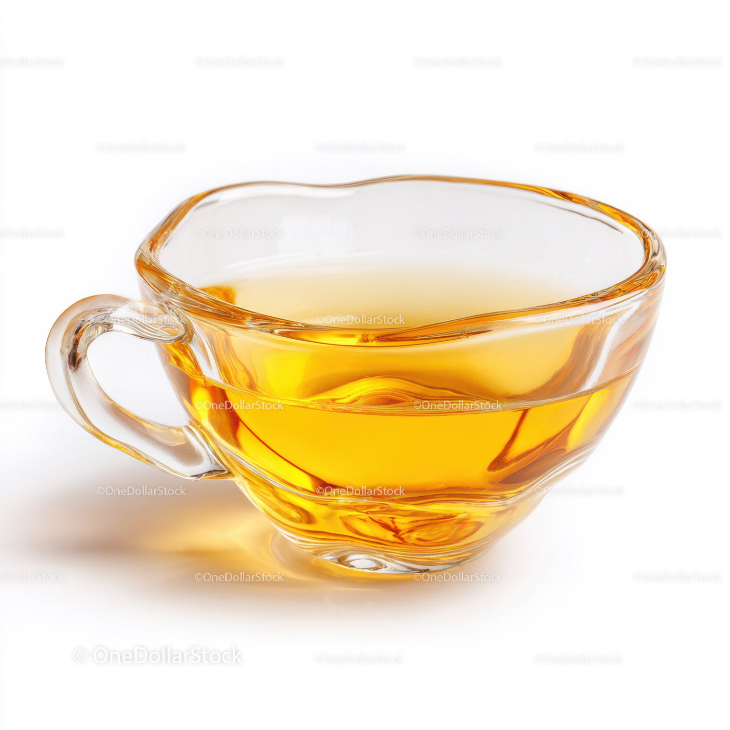 Elegant Clear Glass Tea Cup with Amber Liquid for Refreshing Drinks