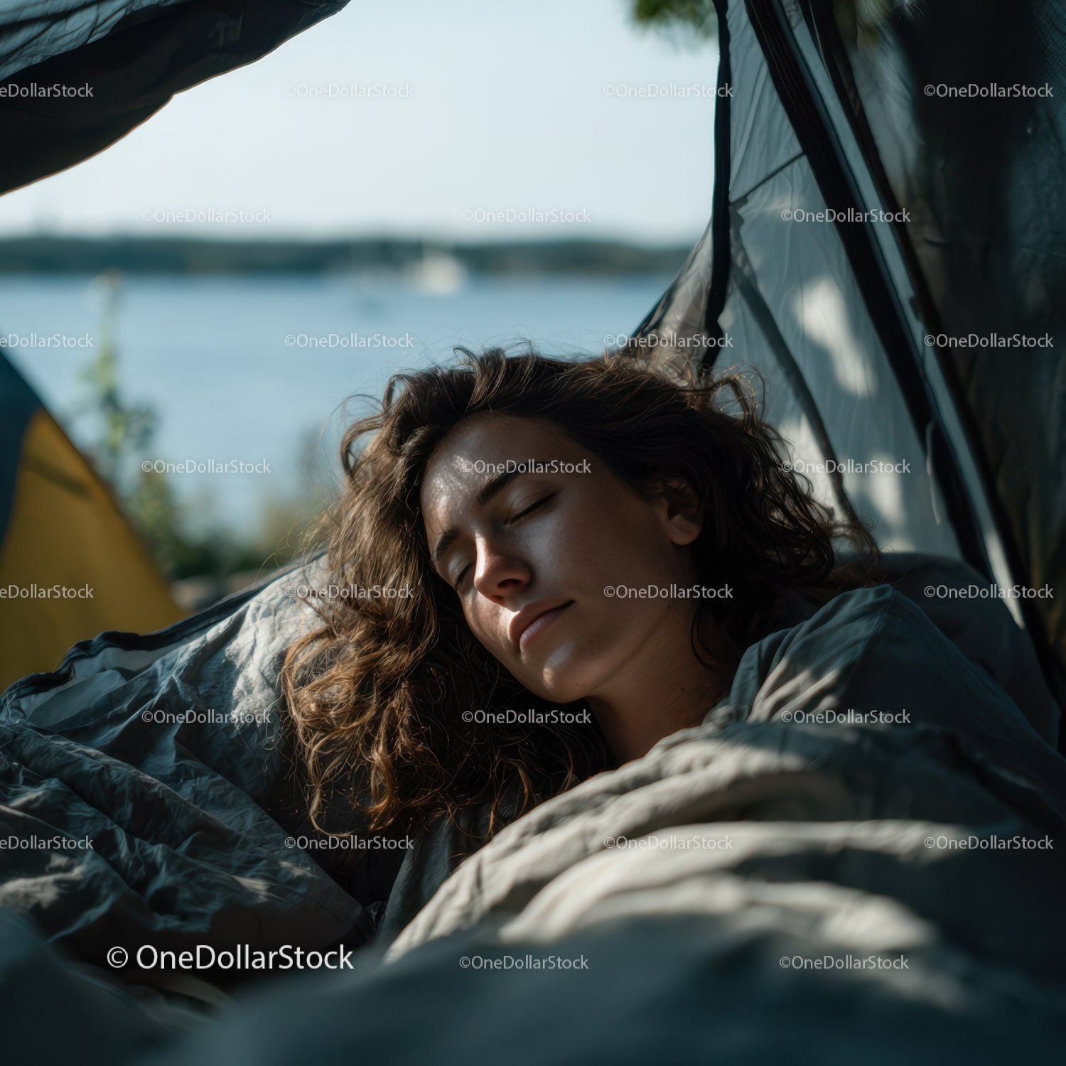Peaceful Woman Sleeping Inside Tent by Lake During Camping Trip