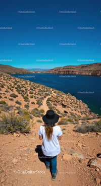 Scenic Desert Canyon Landscape with Woman Hiking Near Lake