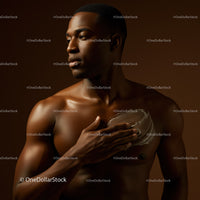 Charming Male Model in Artistic Studio Portrait with Warm Lighting