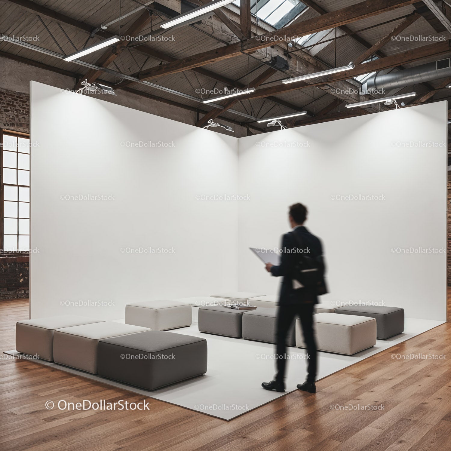 Modern workspace with minimalist seating and man walking