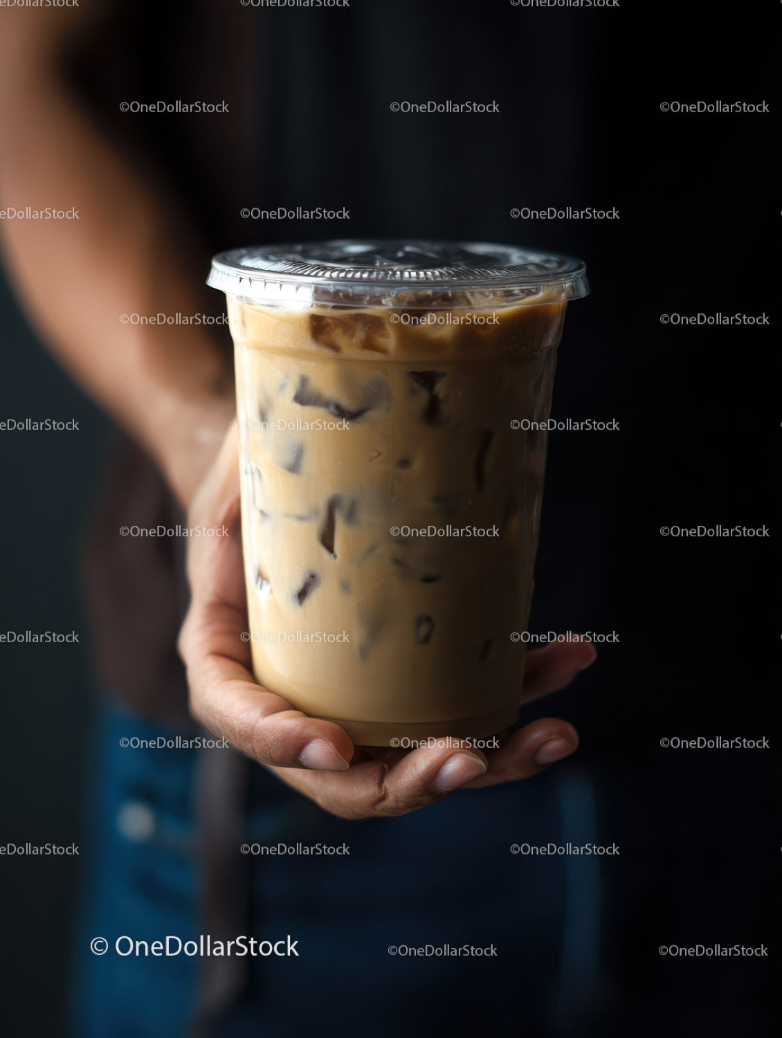 Refreshing Iced Coffee in Clear Plastic Cup with Ice Cubes