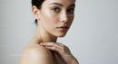 Elegant Beauty Portrait of Young Woman with Flawless Skin and Hazel Eyes