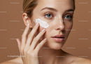 Young Woman Applying Moisturizer for Flawless Skin