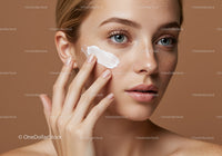 Young Woman Applying Moisturizer for Flawless Skin
