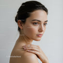 Elegant Young Woman with Natural Makeup and Clear Skin