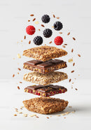 Layered granola bars with chocolate and fresh berries