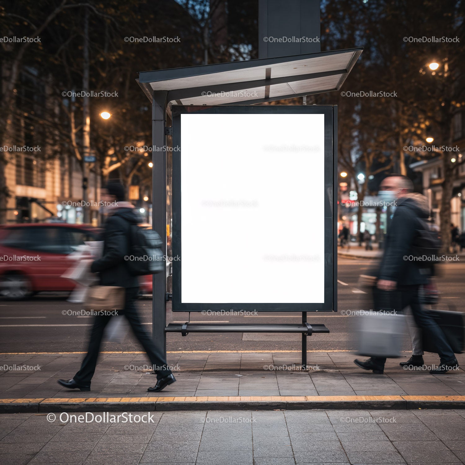 Blurred commuters passing illuminated city bus stop ad