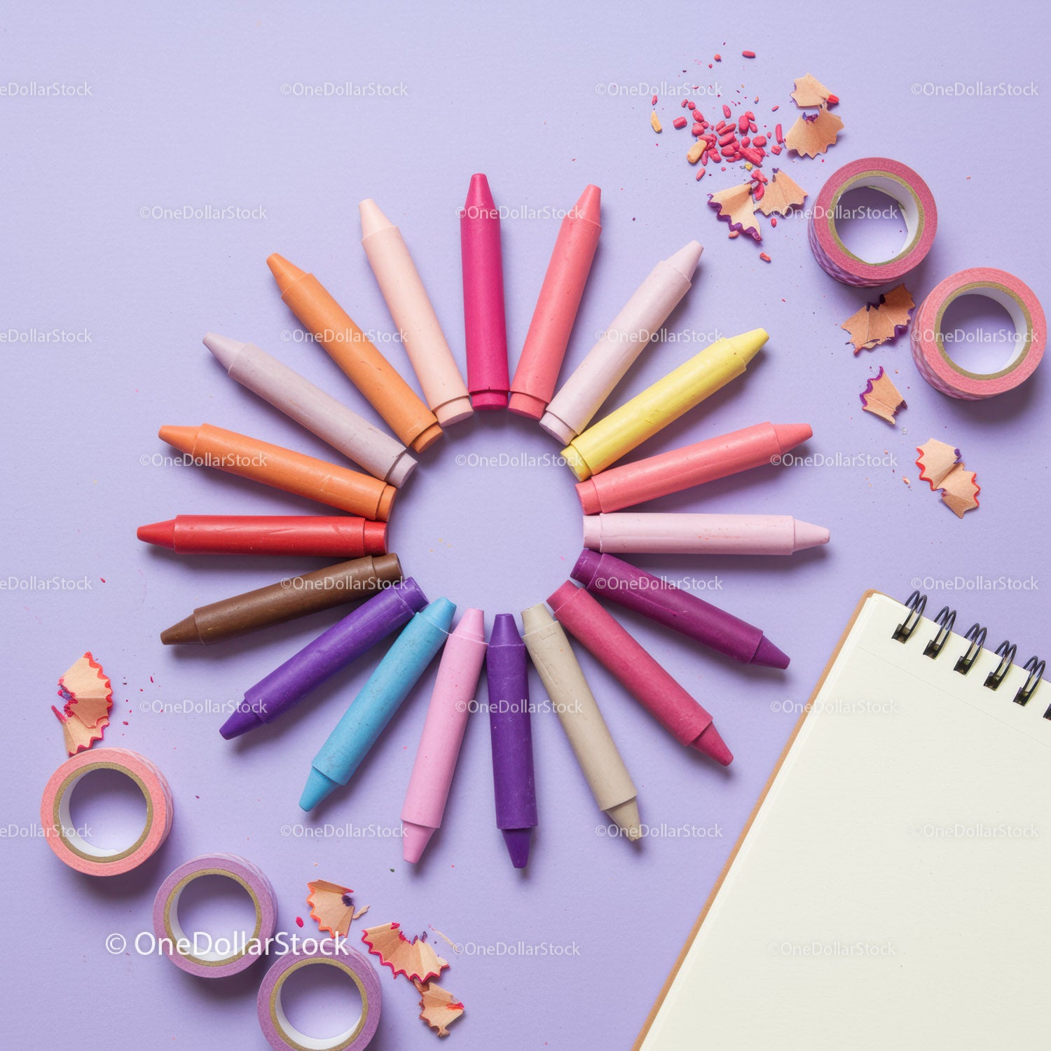Colorful Crayons and Craft Supplies on Purple Surface